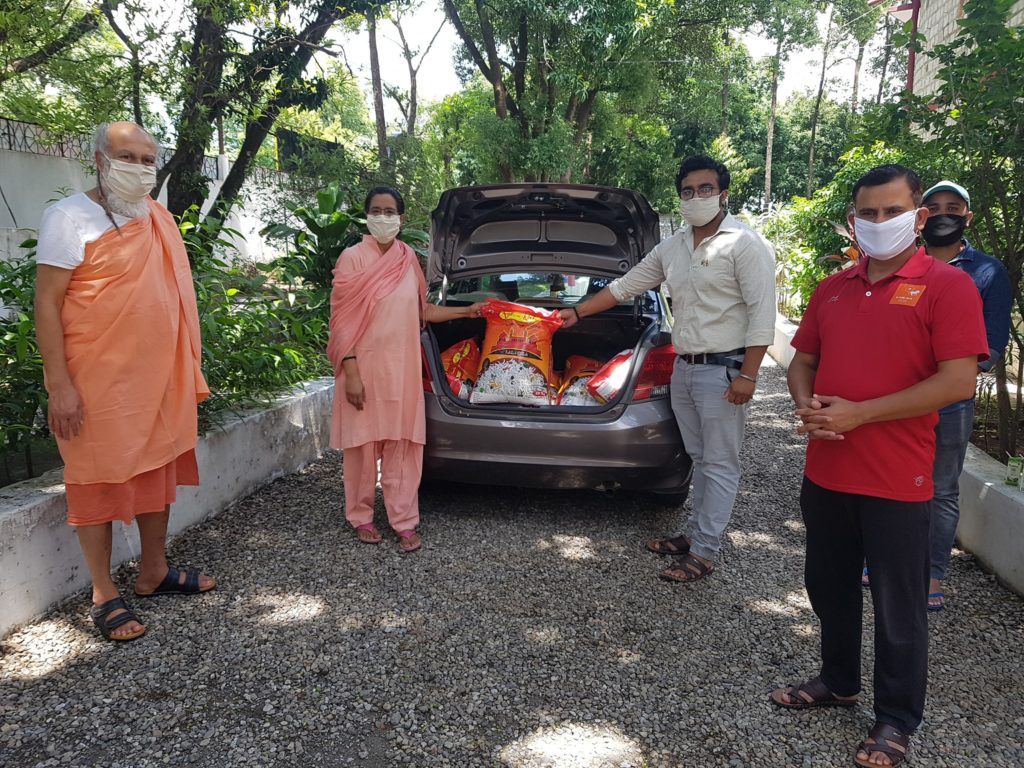 Distribution of rations to the needy at Dehradun Ashram photo1